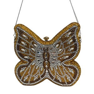 Close-up of luxury butterfly evening clutch bag with sparkling multicolored rhinestones