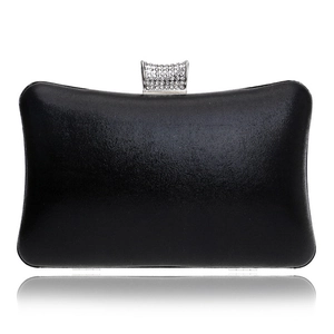 Close-up of the sparkling rhinestone clasp on this elegant black evening clutch bag