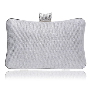 Elegant silver sequin evening clutch bag with sparkling rhinestone closure on white background