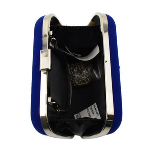 Interior view of luxury purple velvet evening clutch with silver chain and metal frame