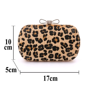 Leopard print evening clutch bag showing 17cm length 10cm height and 5cm width dimensions
