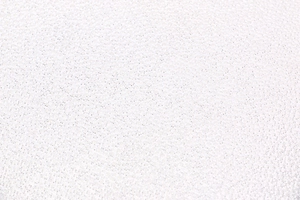 Macro view showing the white breathable mesh fabric and high-density fiber texture detail