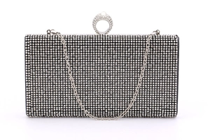 Macro detail of rectangle mermaid evening bag with rhinestones and silver chain strap