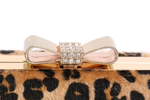 Leopard print evening clutch with bow-shaped rhinestone clasp and golden metal frame
