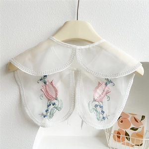 Detail view of white organza faux collar with pink tulip embroidery and lace edging