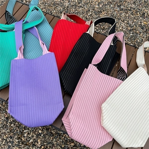 Large capacity pleated knit tote bags in various vibrant colors for summer shopping