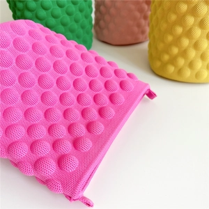 Pink knit bubble textured bucket tote bag with pearl handle and zipper closure for women