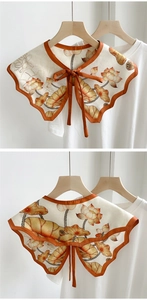Detail of floral lotus printed silk collar scarf with orange edge binding and tie knot