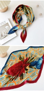 Detailed view of pleated satin square scarf with artistic floral and geometric patterns