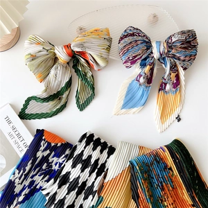 Fashionable pleated square silk scarf for women featuring floral and bohemian patterns