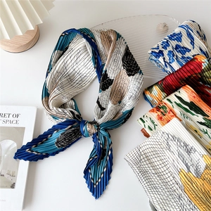 Elegant pleated silk scarves set with floral prints for hair styling and neck decor