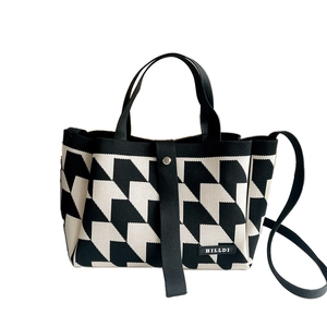Houndstooth knit tote bag with magnetic clasp and detachable crossbody shoulder strap