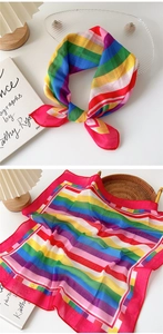 Detail of multi-colored rainbow striped cotton linen square scarf with DO MORE print