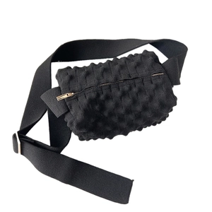 Unique popcorn texture black knit crossbody bag with wide strap and metallic zipper