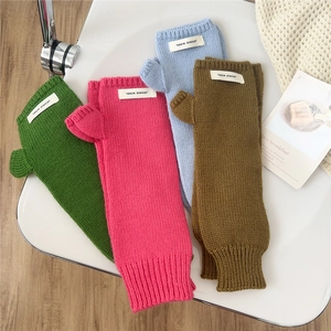 Thick warm knit fingerless gloves for women in four bright colors for autumn and winter