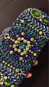 Elegant clutch bag with colorful rhinestones in floral geometric patterns for evening parties