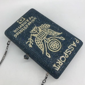 Navy blue passport-shaped rhinestone evening clutch bag with eagle emblem and silver chain