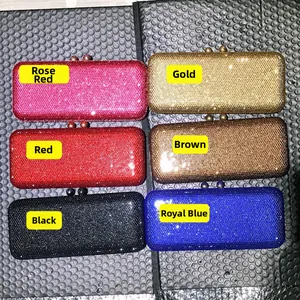 Flat lay of rectangular evening clutch bags with sparkling rhinestones in six colors
