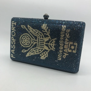 Sparkly dark blue and gold rhinestone clutch bag in United States passport design