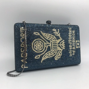 Deep blue passport style rhinestone clutch bag with shimmering crystals and chain strap