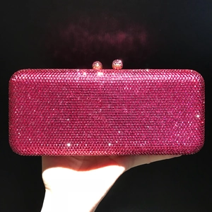 Sparkling rose pink rhinestone clutch bag for evening parties with metallic ball clasp