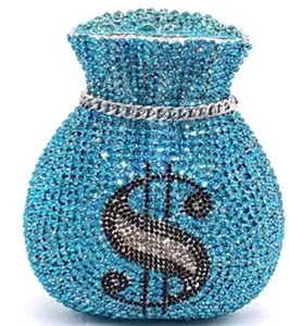 Macro shot of lake blue money bag clutch bag with crystal rhinestones and dollar sign