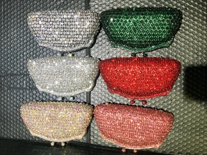 Detailed grid showing six crystal-encrusted clutch bags in silver, green, red and pink