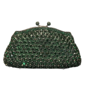 Deep green hollow metal clutch bag with emerald rhinestones and vintage clasp