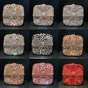 Grid view showing nine colors of bow-shaped crystal clutch bags with rhinestones