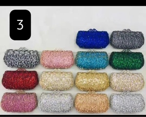 Detailed view of wave-textured evening clutches in a variety of vibrant rhinestone colors