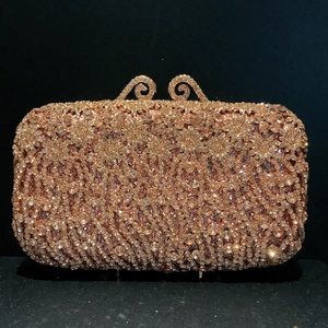 Elegant champagne gold hollow evening clutch bag with sparkling crystals and metal clasp