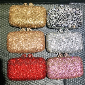 Elegant hollow clutch bags set with sparkling crystals in multiple colors for evening parties