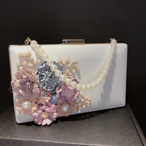 White square clutch bag with 3D fabric flowers, pearls and golden chain for weddings