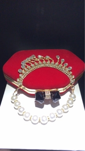 Red velvet shell evening bag with pearl handle and rhinestone crown bow decoration