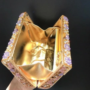 Luxurious leaf rhinestone evening clutch bag with gold chain and interior capacity view