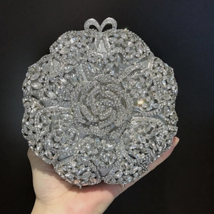 Sparkling silver flower evening clutch bag with full rhinestone crystals and bow clasp