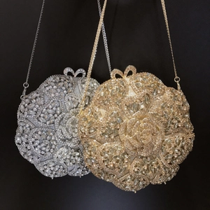 Elegant floral evening clutch with diamonds in gold and silver with metal chain