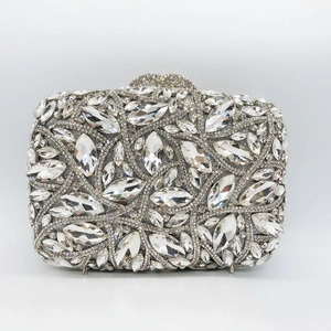 Macro shot of luxury clutch purse with marquise and round crystals on metal base