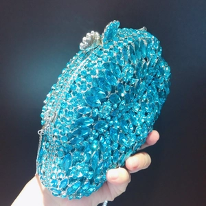 Detailed macro view of the blue rhinestone evening clutch with luxury crystal embellishments
