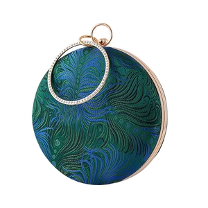 Elegant round evening bag with peacock feather embroidery and rhinestone metal handle