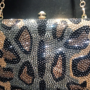 Luxury leopard print evening clutch with sparkling rhinestones and gold chain strap
