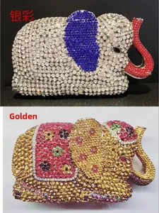 Detailed macro view of crystal-encrusted elephant-shaped clutches in silver and gold colors