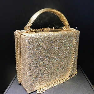 Sparkling iridescent gold sequin evening clutch bag with metallic handle and chain strap