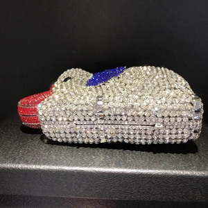 Close-up of a luxury elephant-shaped evening clutch bag with sparkling rhinestones