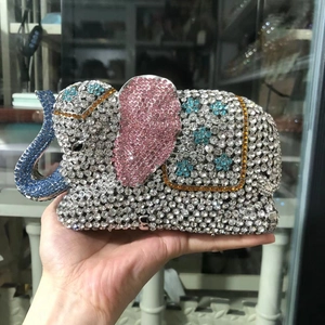 Detailed view of elephant evening clutch with sparkling silver and pink crystal rhinestones
