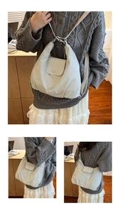 Detail shots of oversized light grey quilted nylon tote bag with magnetic flap and strap