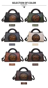 Selection of seven vintage embossed handbags in black, green, beige, and brown colors