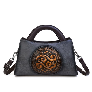 Retro Chinese style embossed handbag in dark grey leather with traditional Ruyi pattern