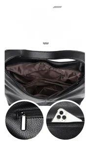 Interior view of black pebbled leather tote showing spacious compartments and back zipper pocket