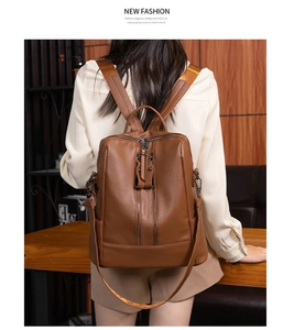 Brown soft leather backpack for women with vertical zippers and adjustable straps
